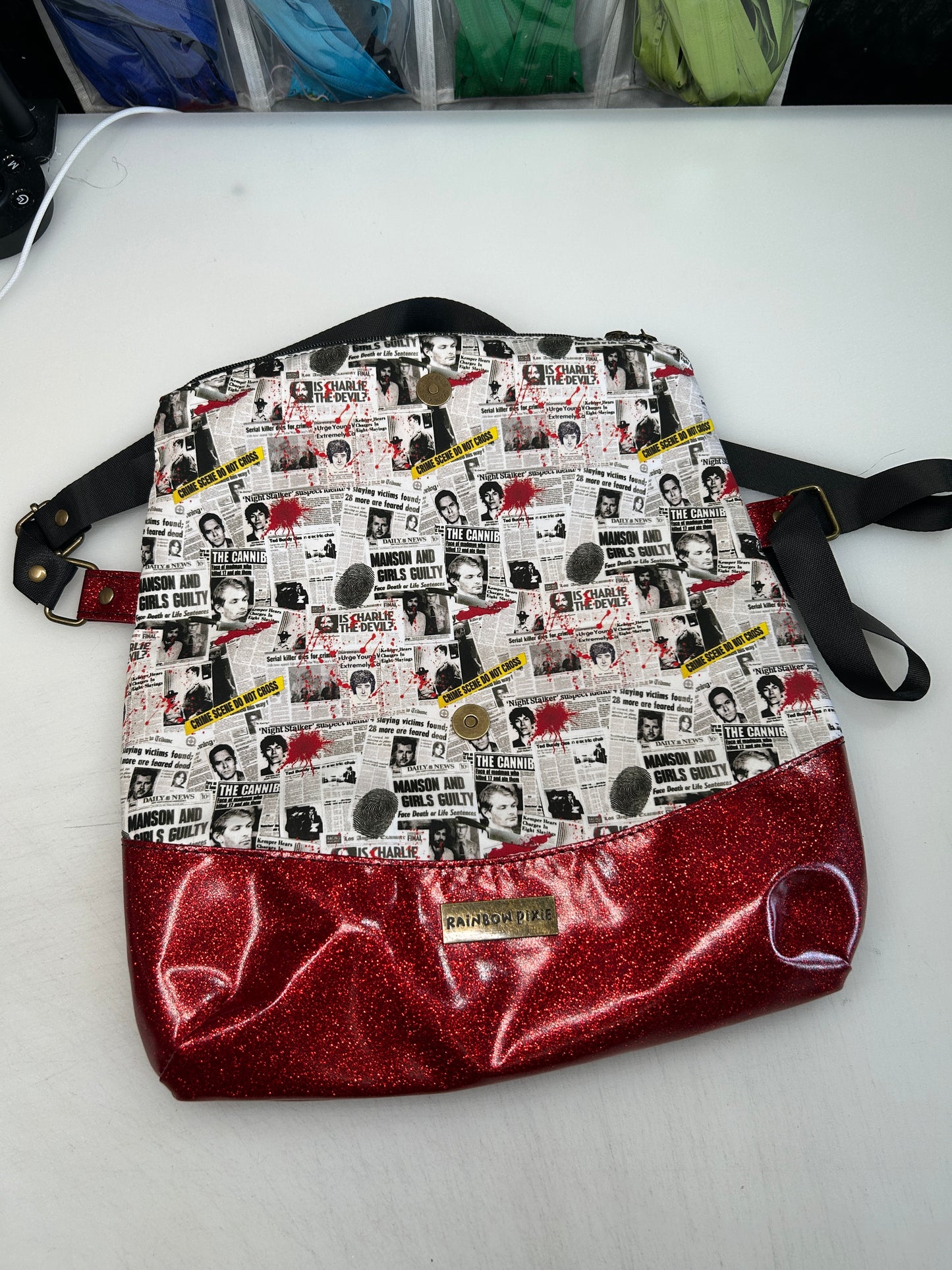 True crime Themed foldover crossbody bag with red glitter bottom