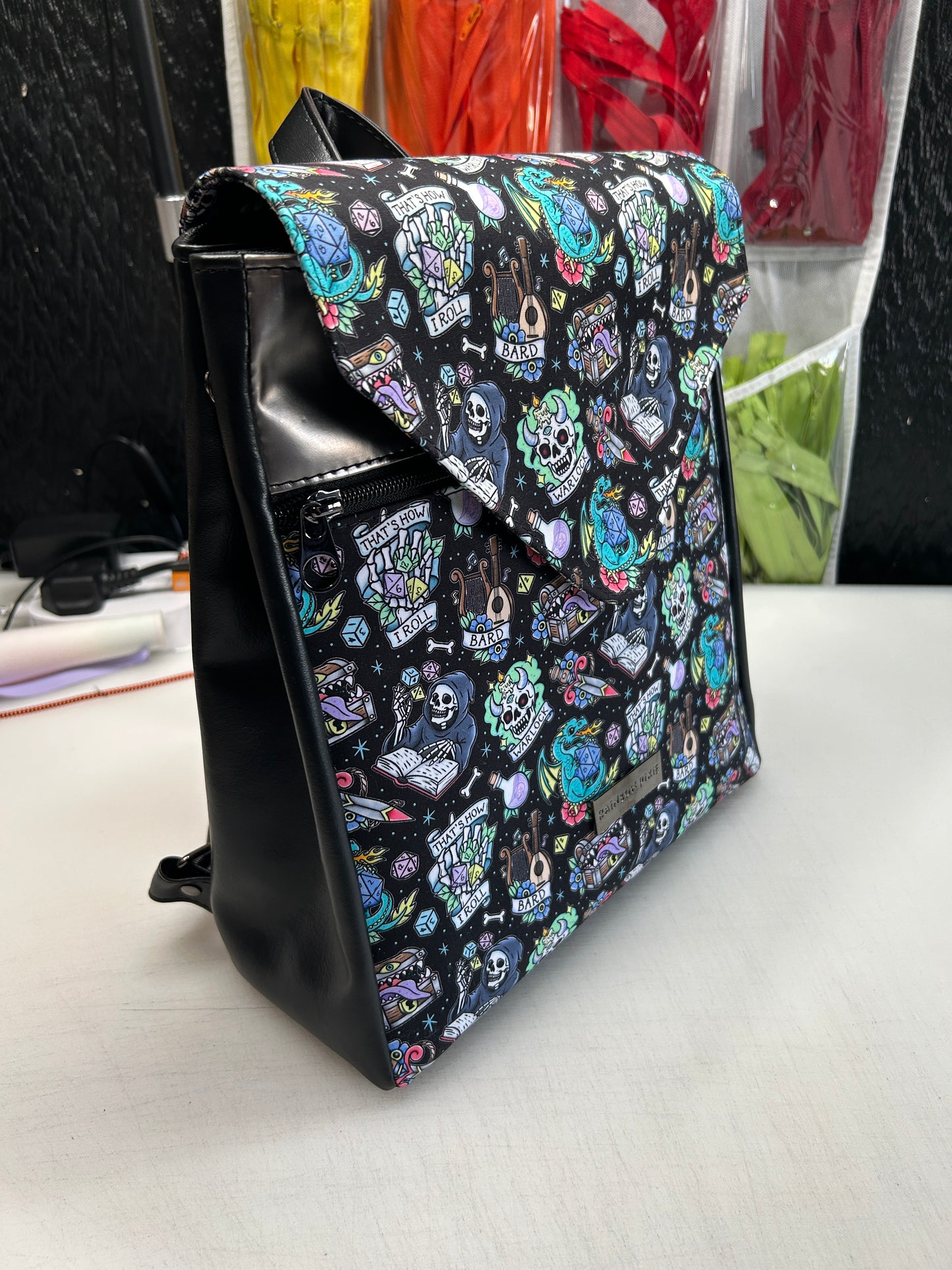 Tattoo Dice Themed expandable square backpack