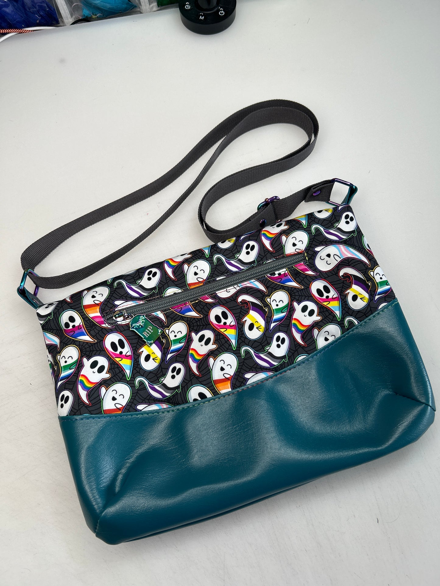 Pride Ghosts Themed foldover crossbody bag with teal bottom