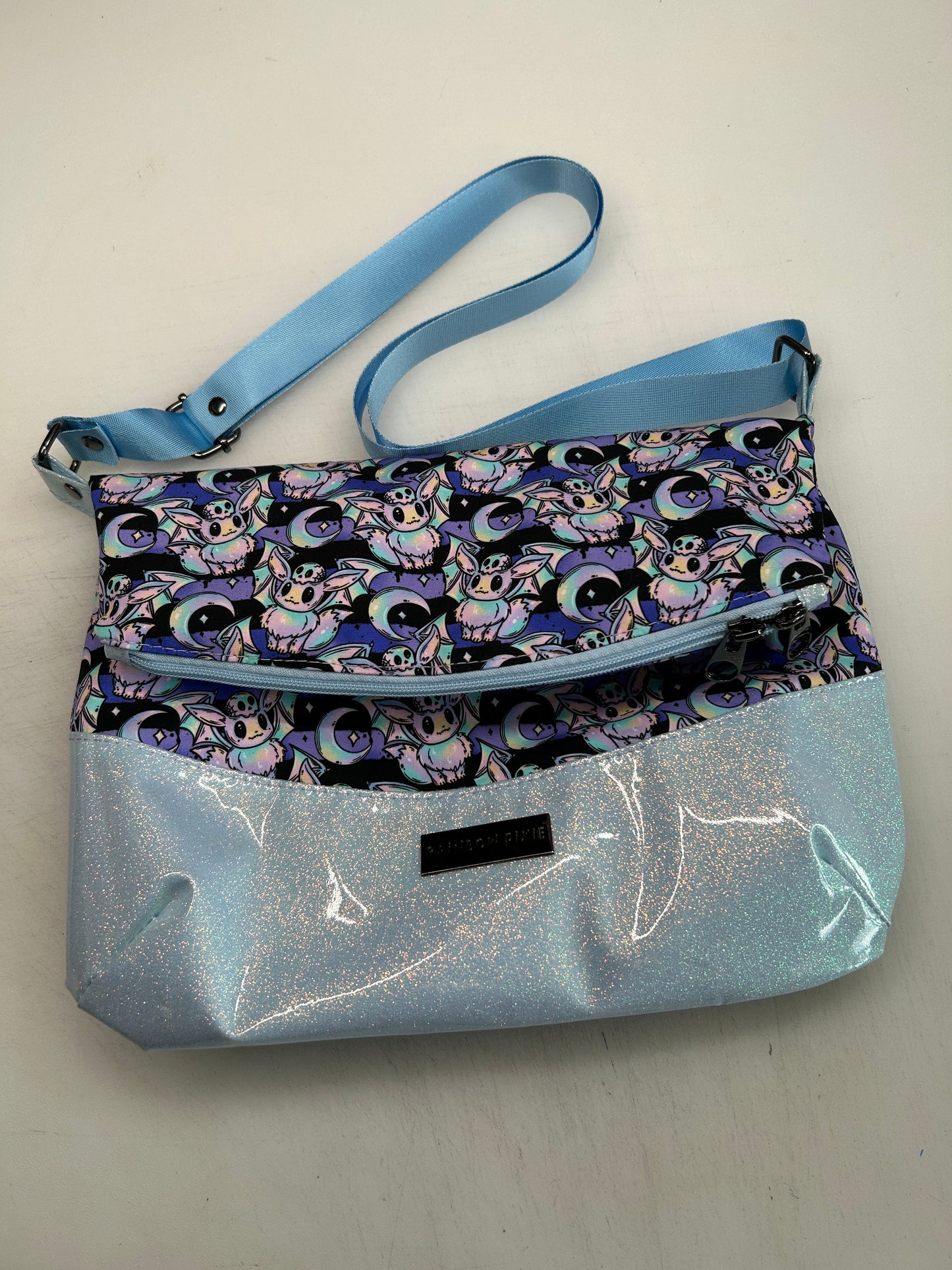 Spooky Eevee Themed foldover crossbody bag with glitter bottom