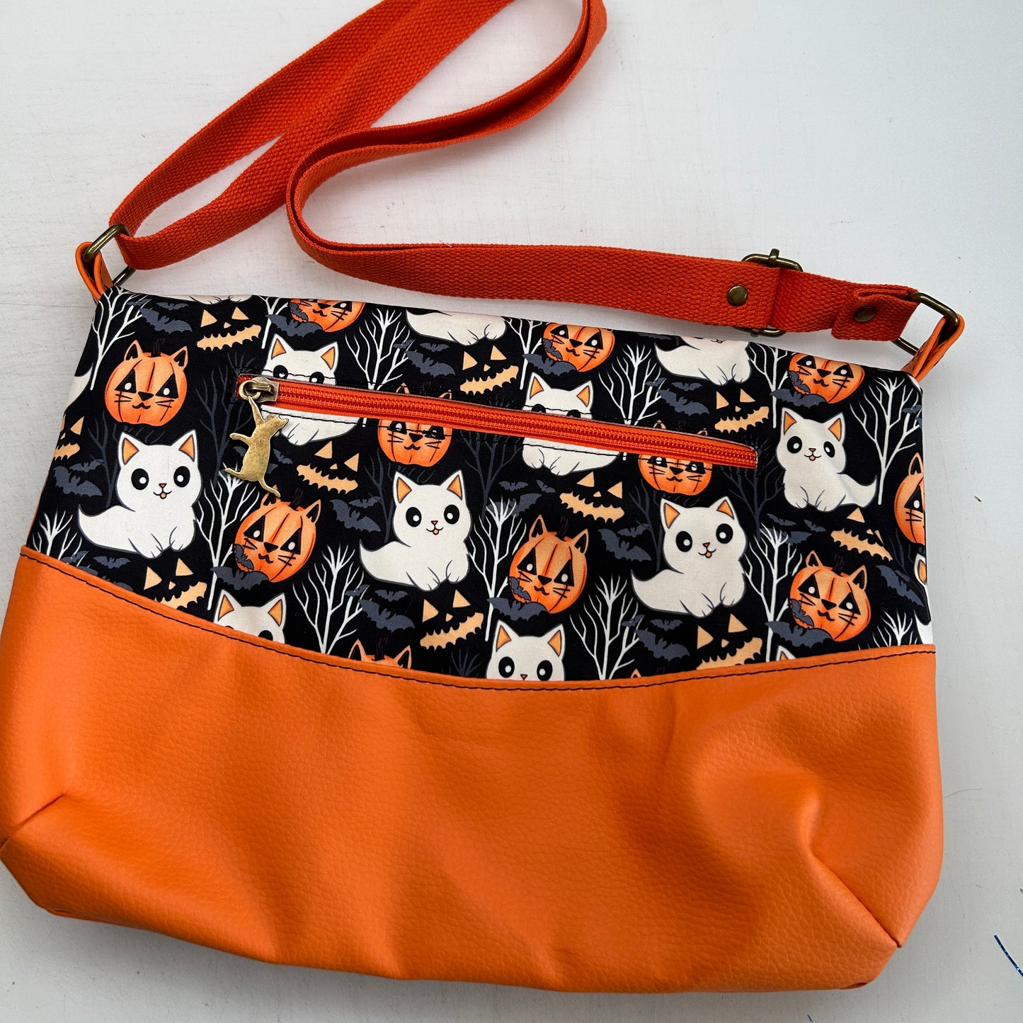 Ghost and Pumpkin cats Themed foldover crossbody bag with orange bottom
