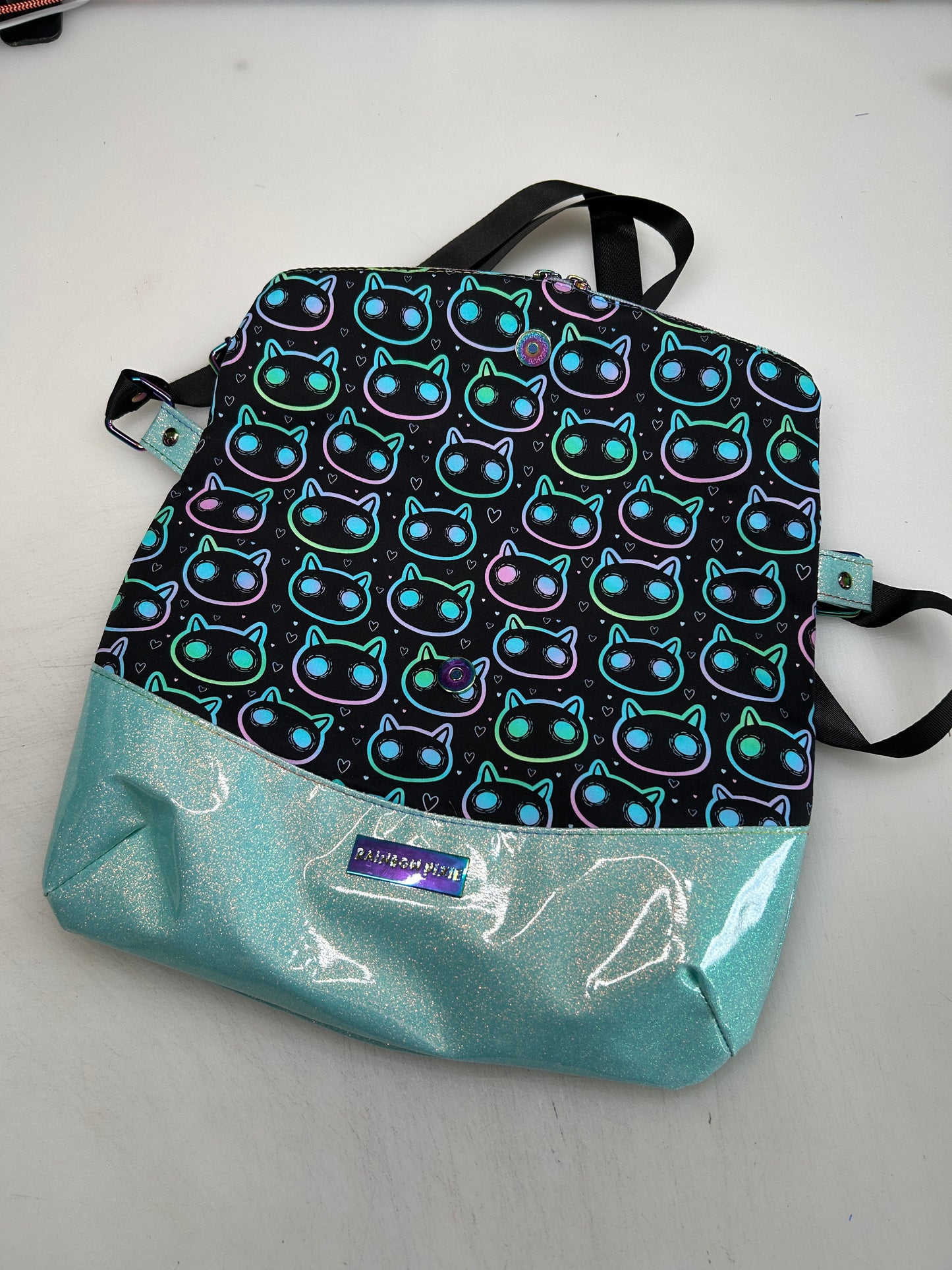 Neon Cat Themed foldover crossbody bag with glitter bottom