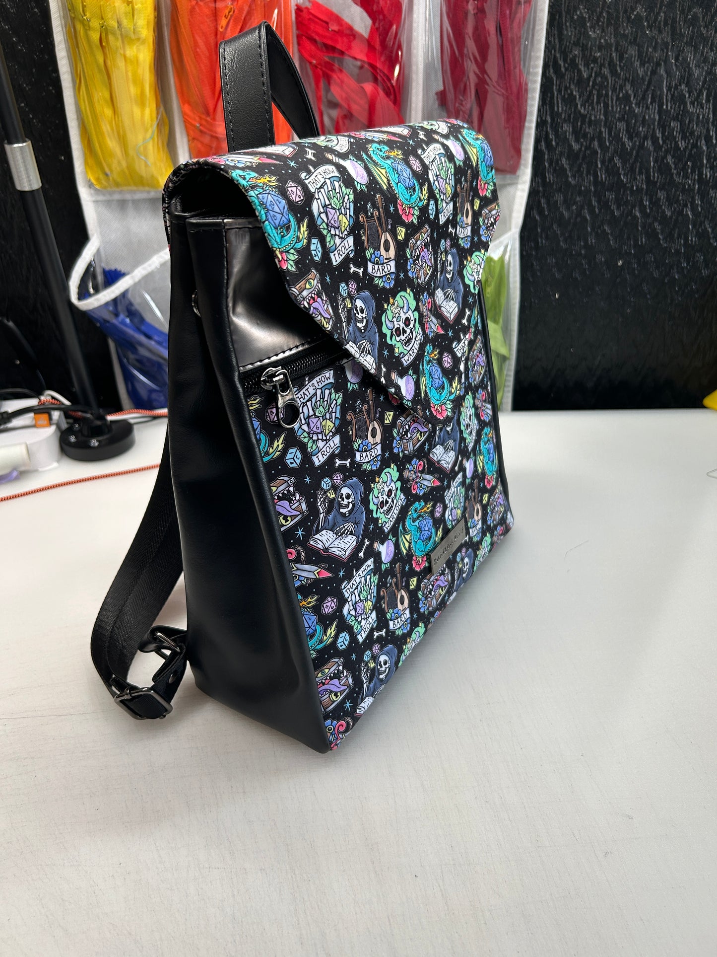 Tattoo Dice Themed expandable square backpack