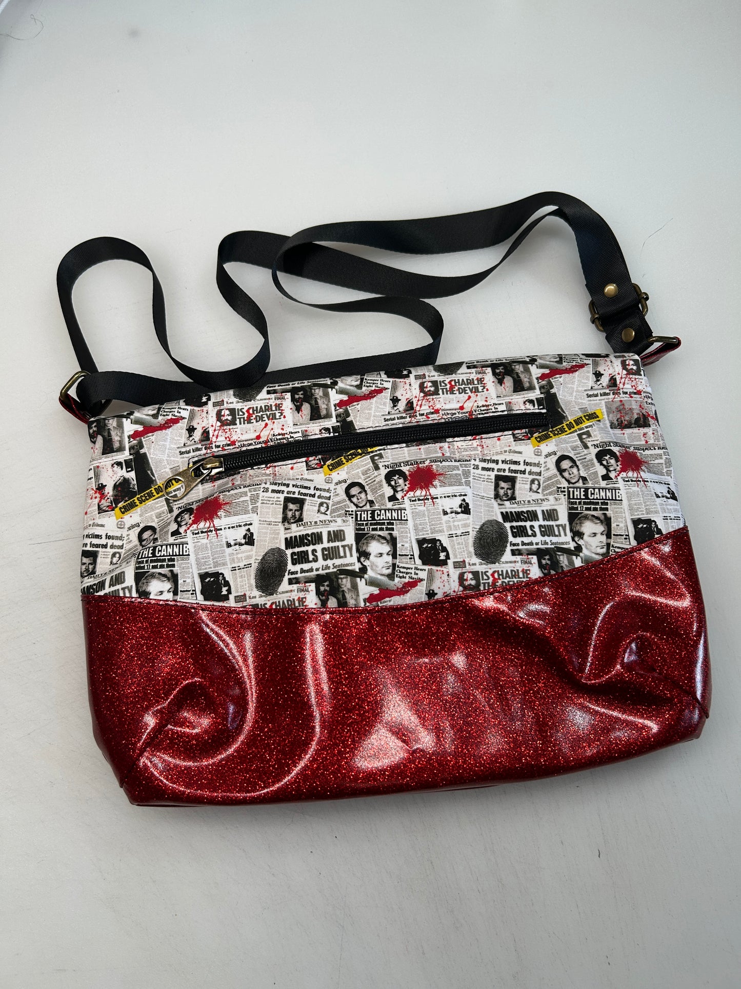 True crime Themed foldover crossbody bag with red glitter bottom