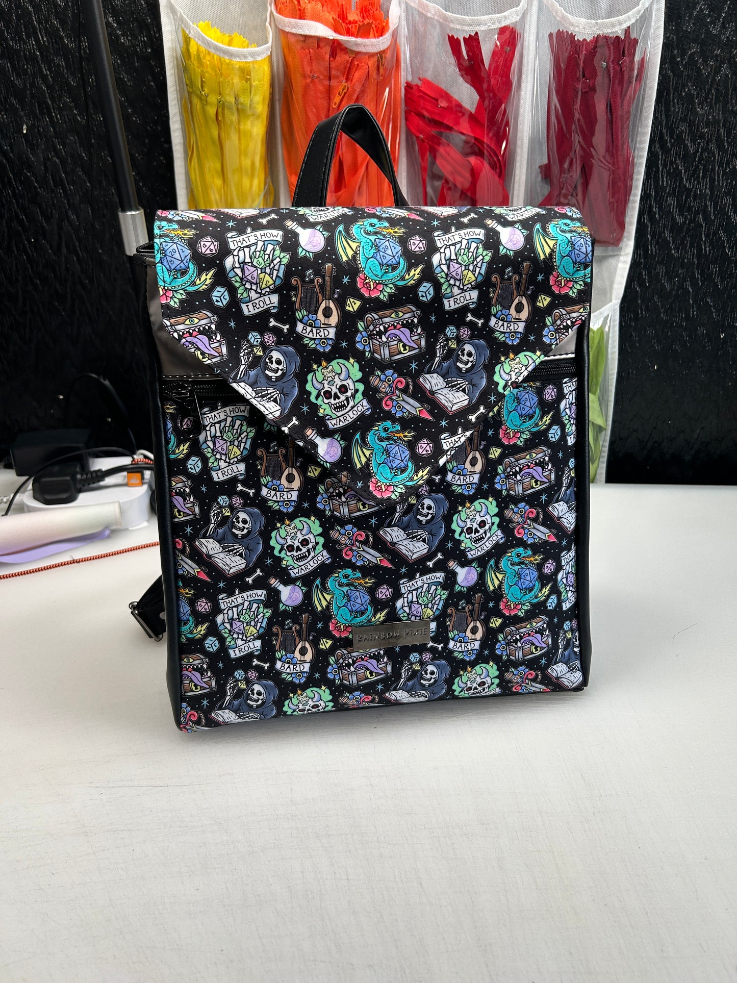 Tattoo Dice Themed expandable square backpack