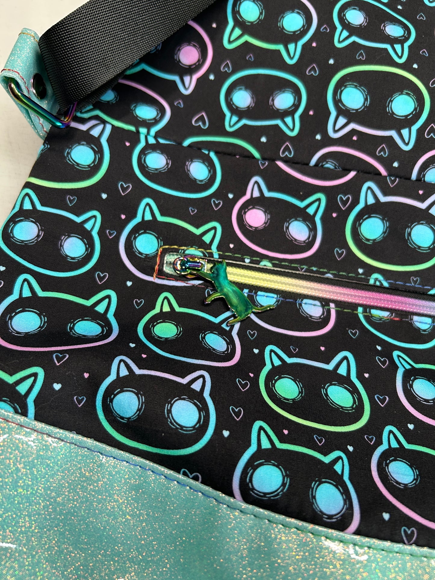 Neon Cat Themed foldover crossbody bag with glitter bottom