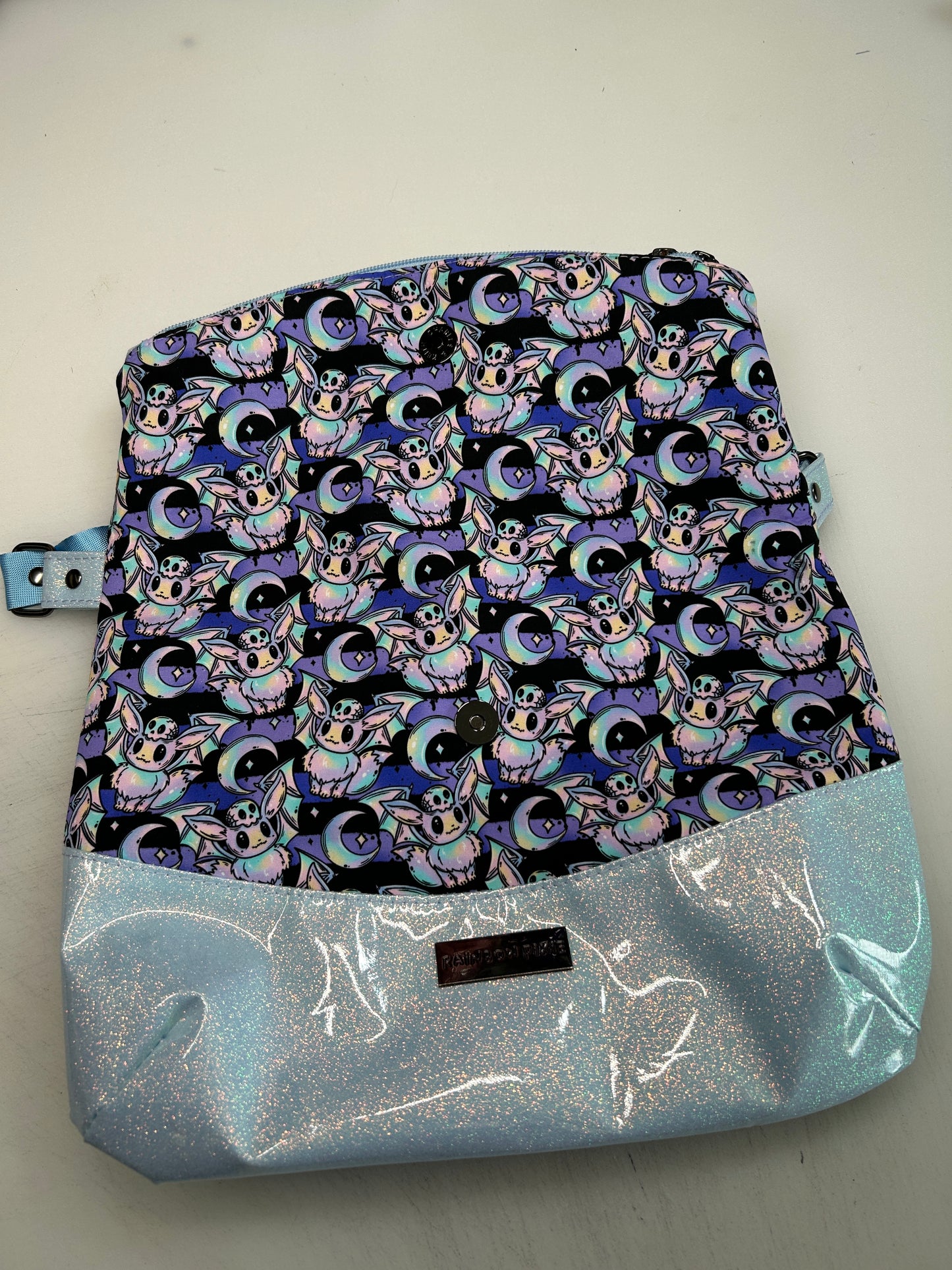 Spooky Eevee Themed foldover crossbody bag with glitter bottom