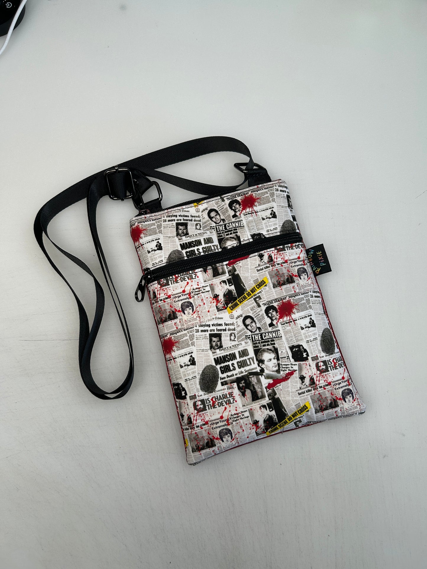 True crime themed small crossbody bag