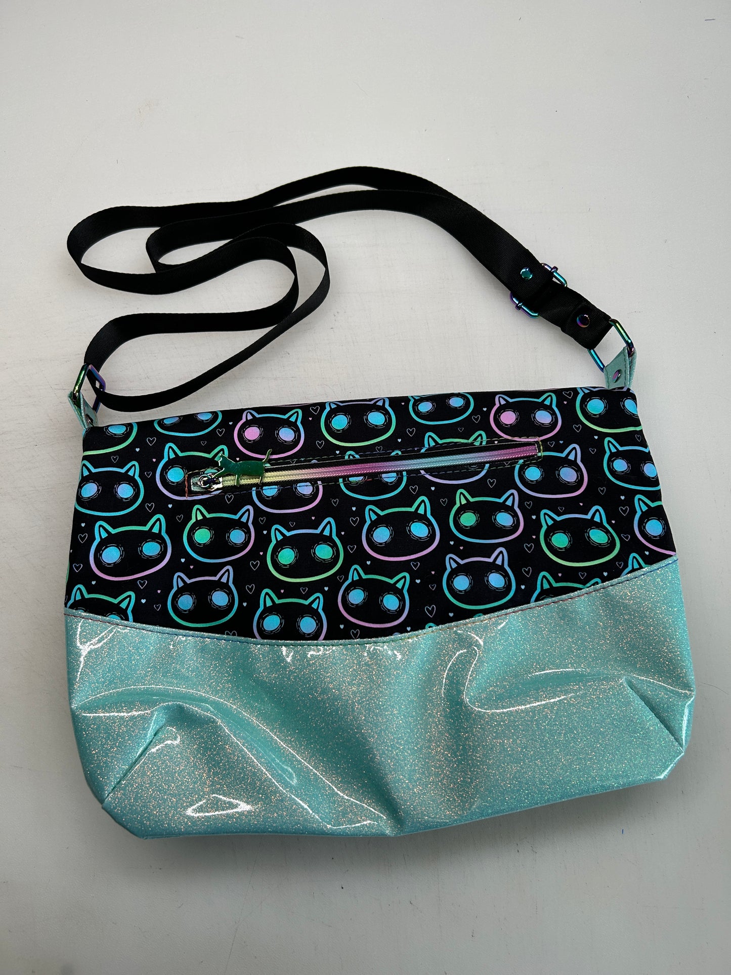 Neon Cat Themed foldover crossbody bag with glitter bottom