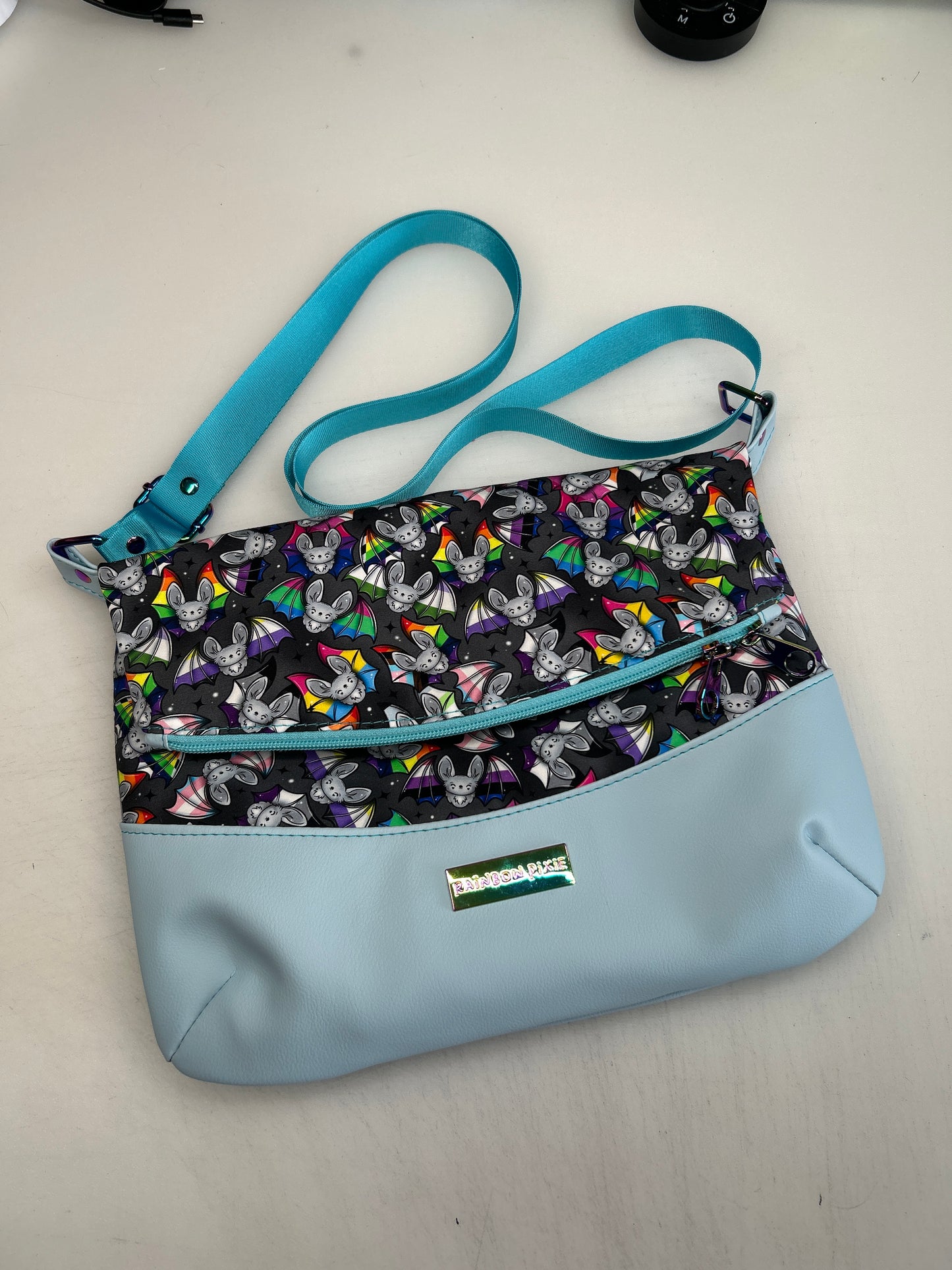 Pride Bats Themed foldover crossbody bag with blue bottom