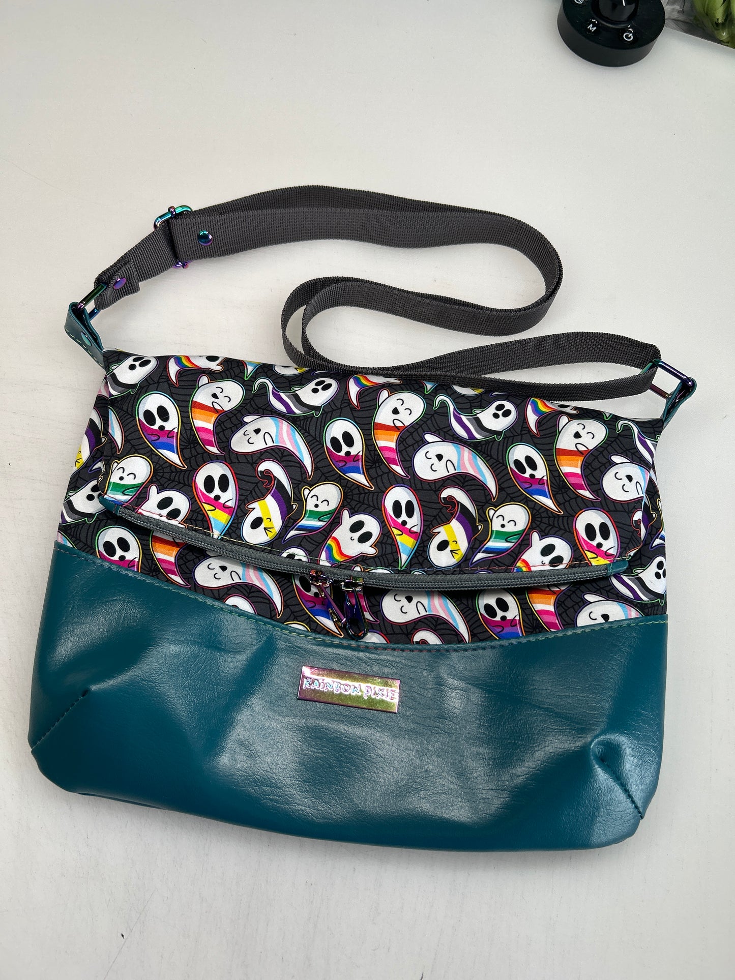 Pride Ghosts Themed foldover crossbody bag with teal bottom