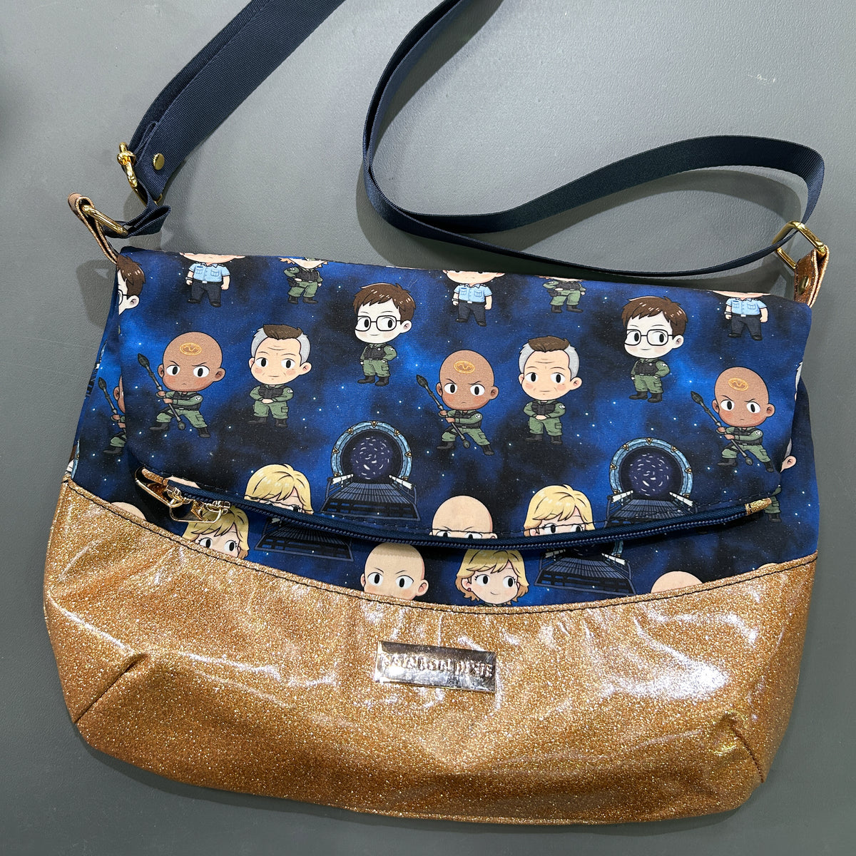 Stargate foldover crossbody bag - image 1