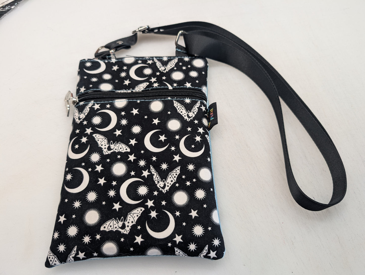 bats and moon themed small crossbody bag with blue metallic Back