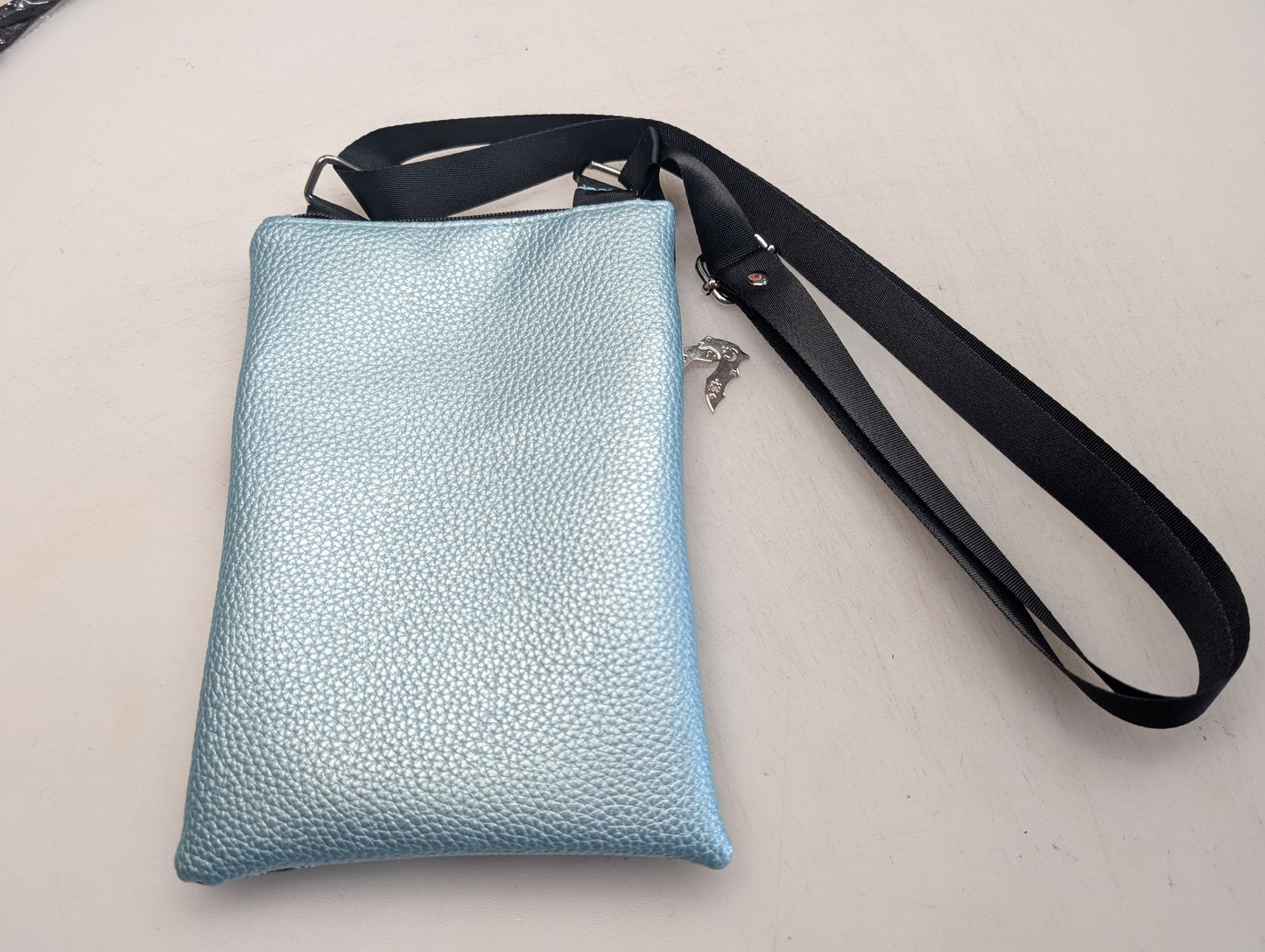 bats and moon themed small crossbody bag with blue metallic Back