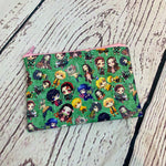 Load image into Gallery viewer, a small purse with a pattern of princesses on it
